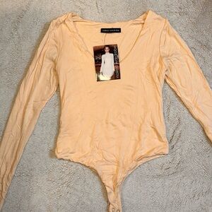 Naked Wardrobe Apricot Long Sleeve Bodysuit
